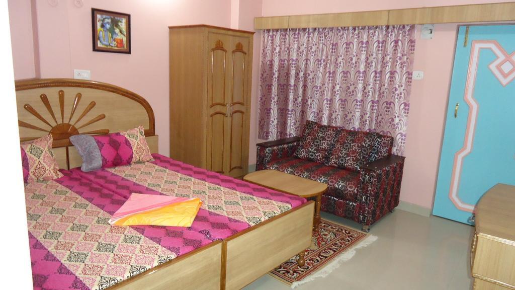فاراناسي Krishna Paying Guest House الغرفة الصورة